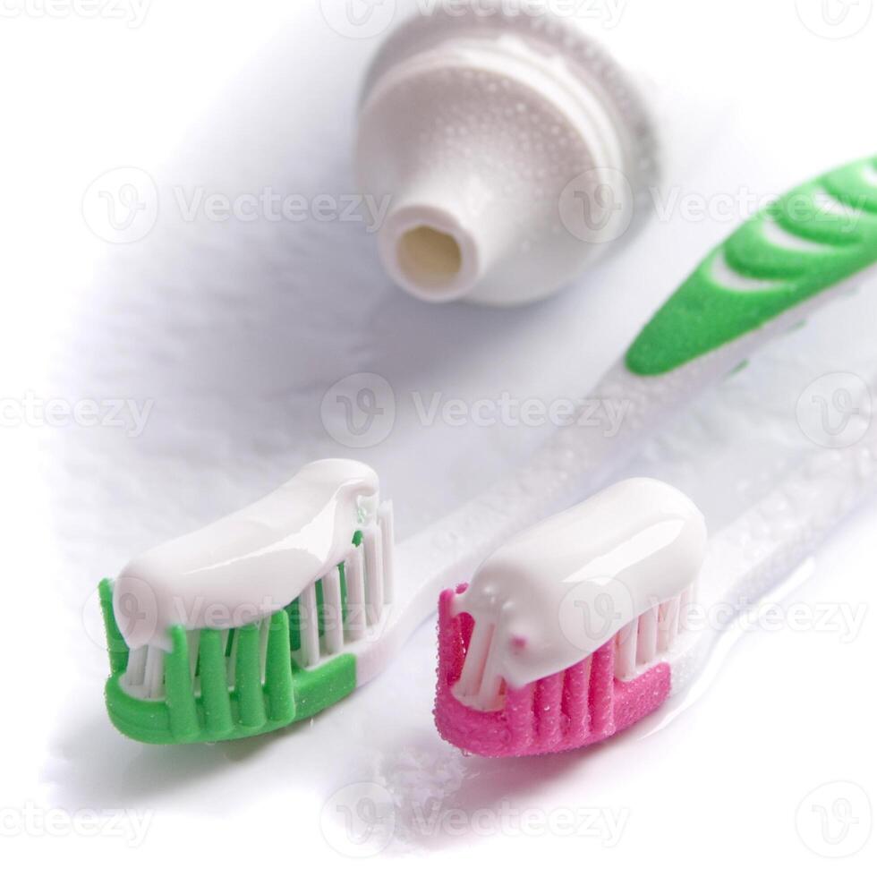 toothpaste and toothbrushes photo
