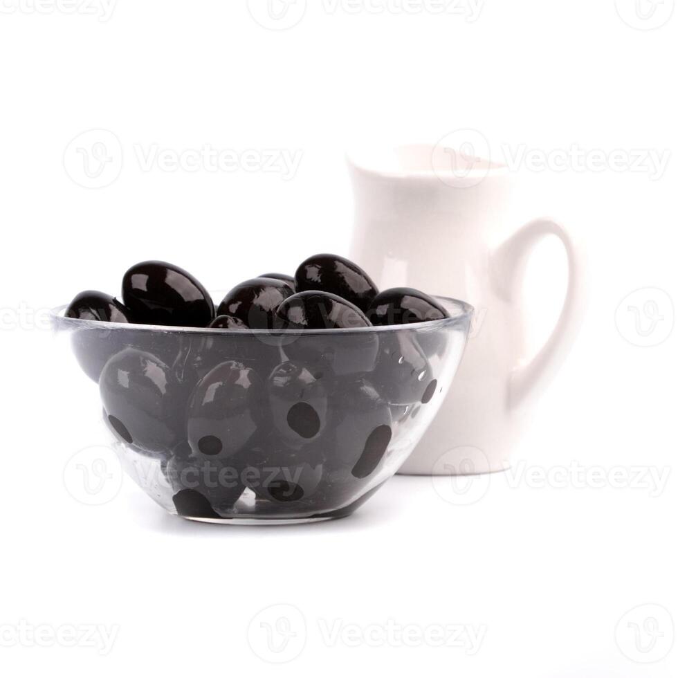 bowl of black olives and oil photo