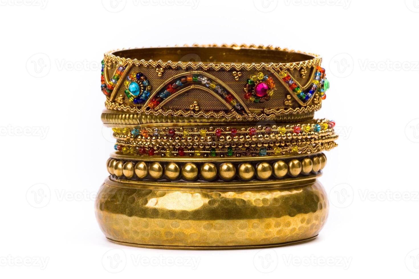 stack of golden bracelets photo