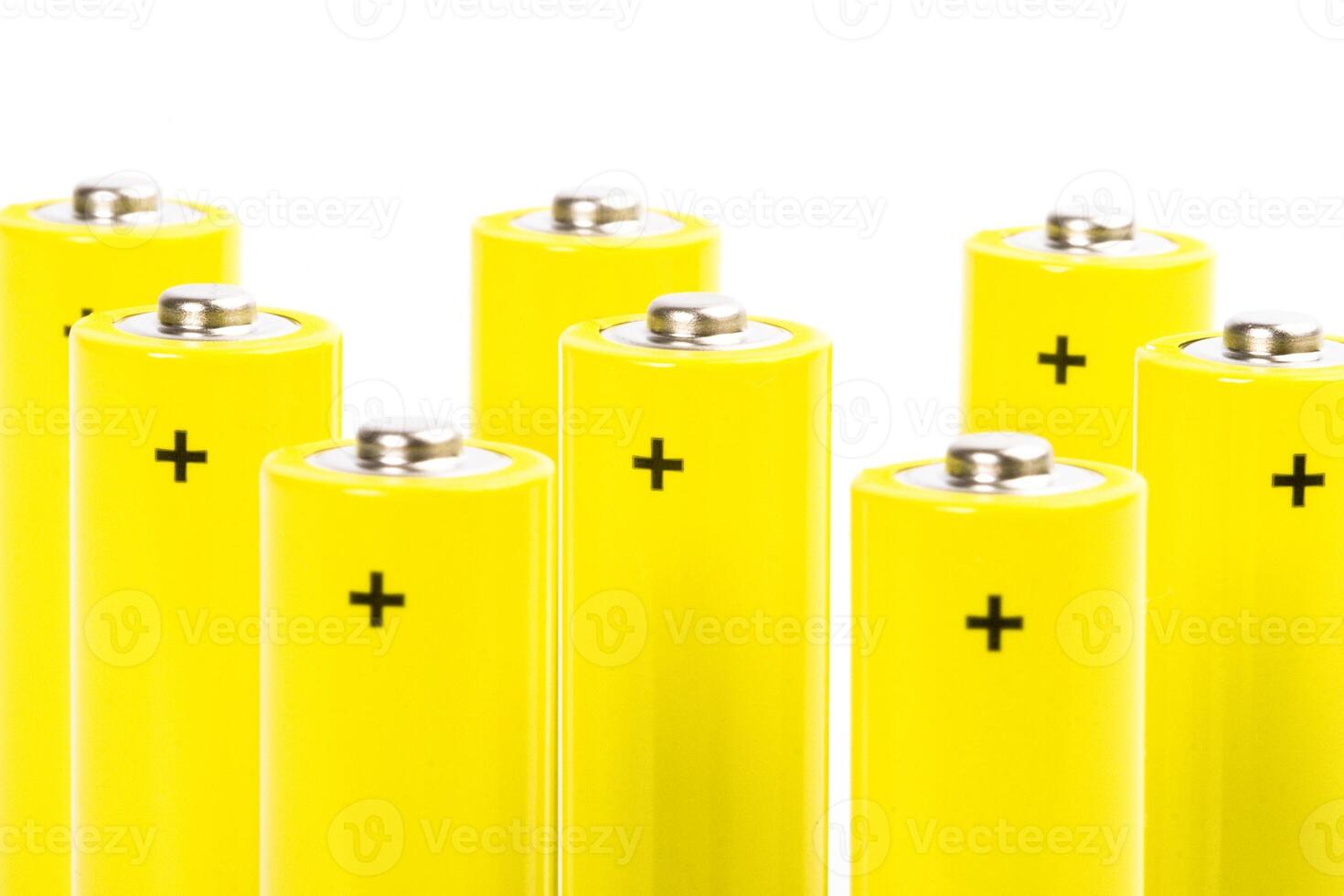 eight yellow alkaline batteries photo