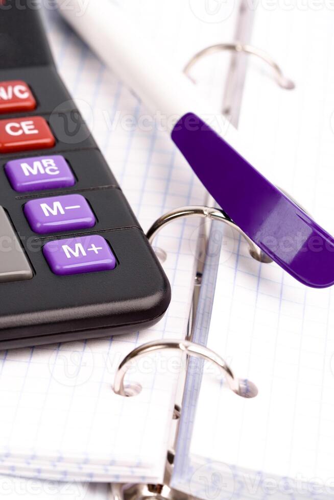 organizer, pen and calculator photo