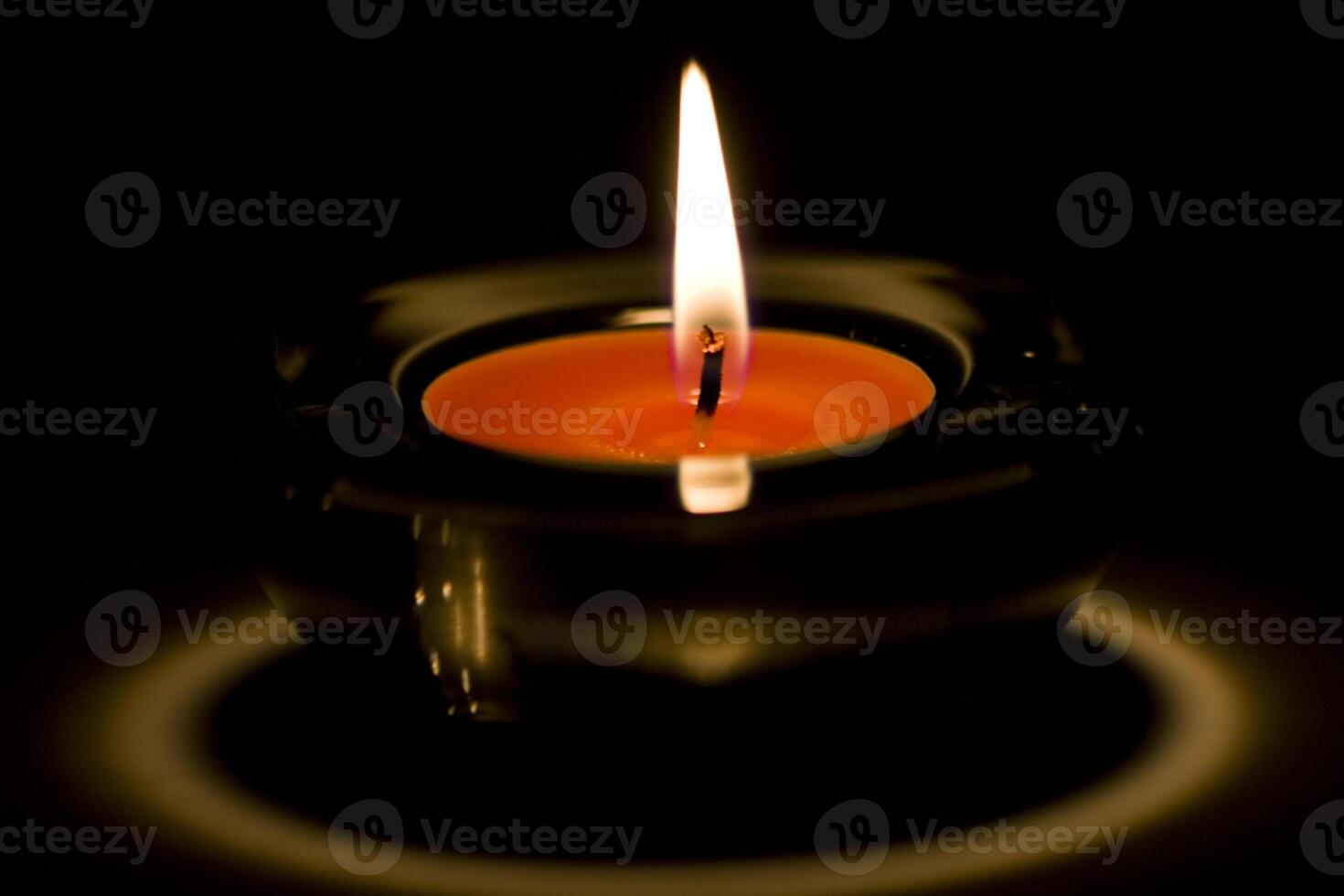 candle flaming close up photo