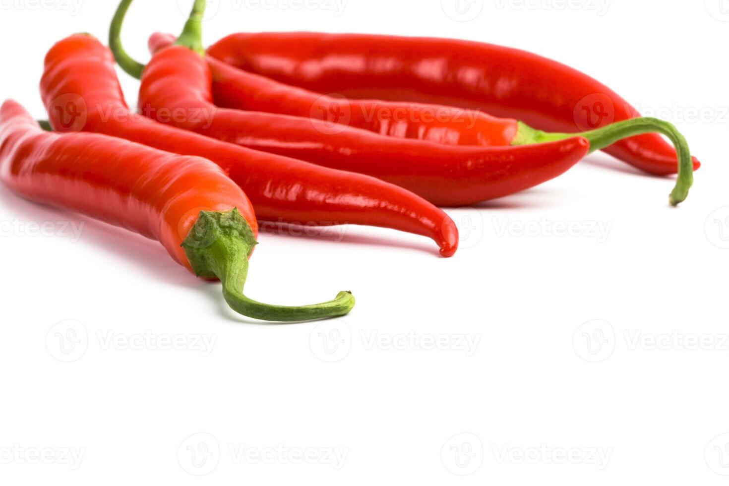 five red chilli peppers photo