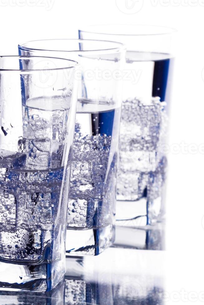 three glasses with cold water photo
