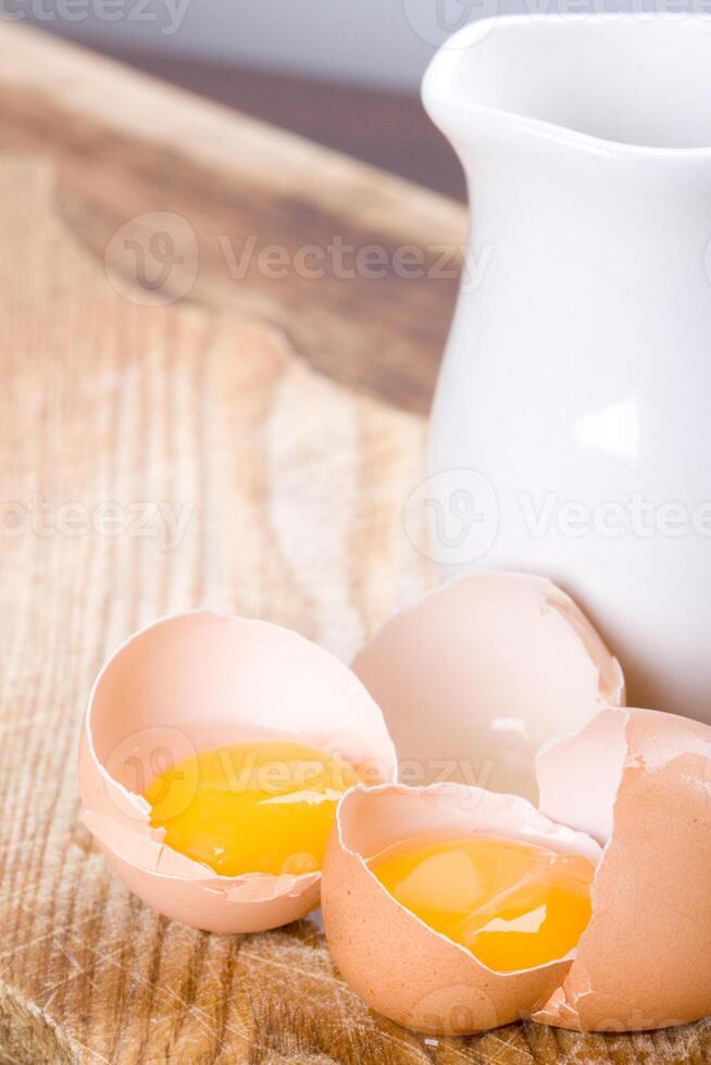 brown eggs and some milk photo