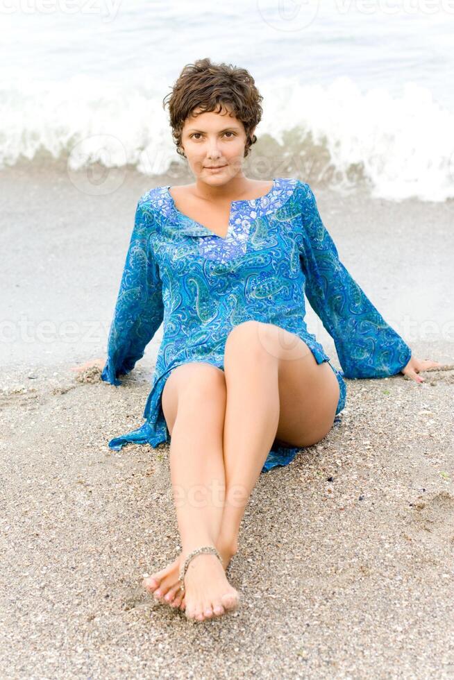 brunet woman in blue photo