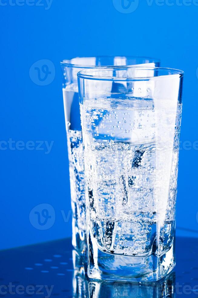 three glasses with cold water photo