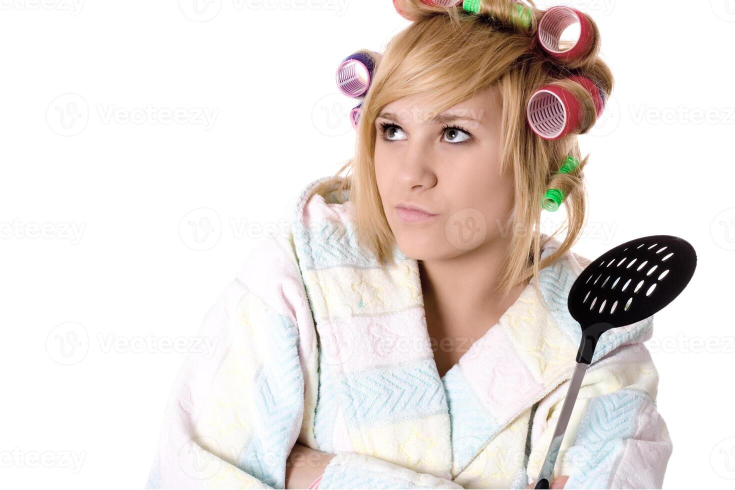 funny housewife with curlers and skimmer photo