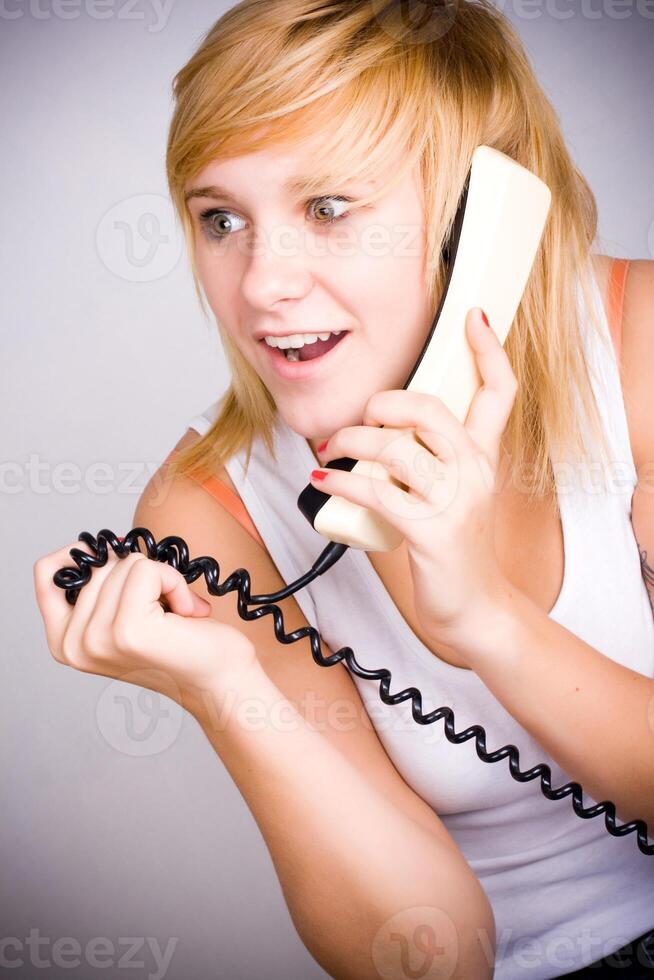 woman with retro telephone photo