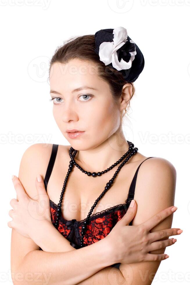 woman in corset and little hat photo