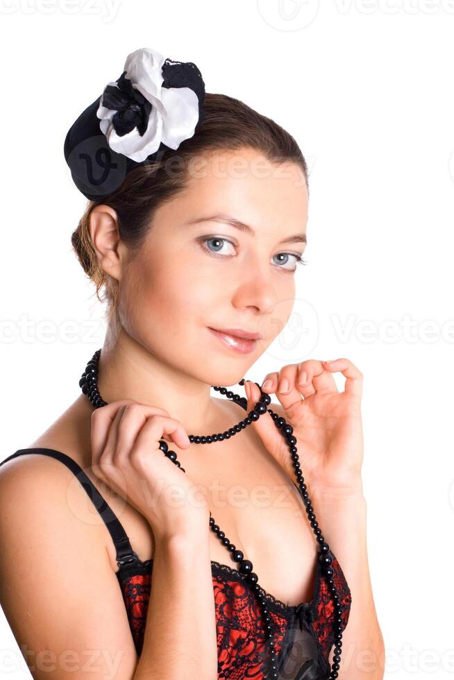 attractive woman in corset and little hat photo
