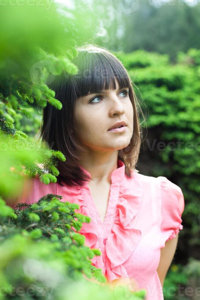 beautiful young girl in the park photo