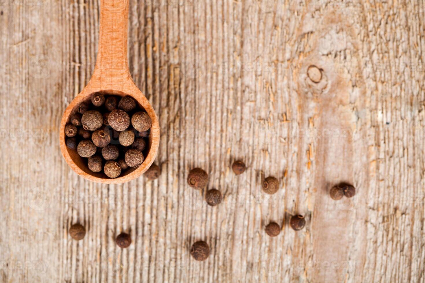 pimento in wooden spoon photo