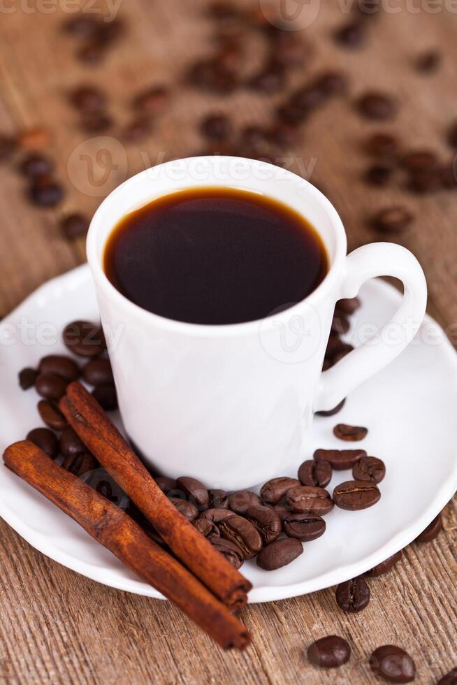 cup of coffee and cinnamon photo