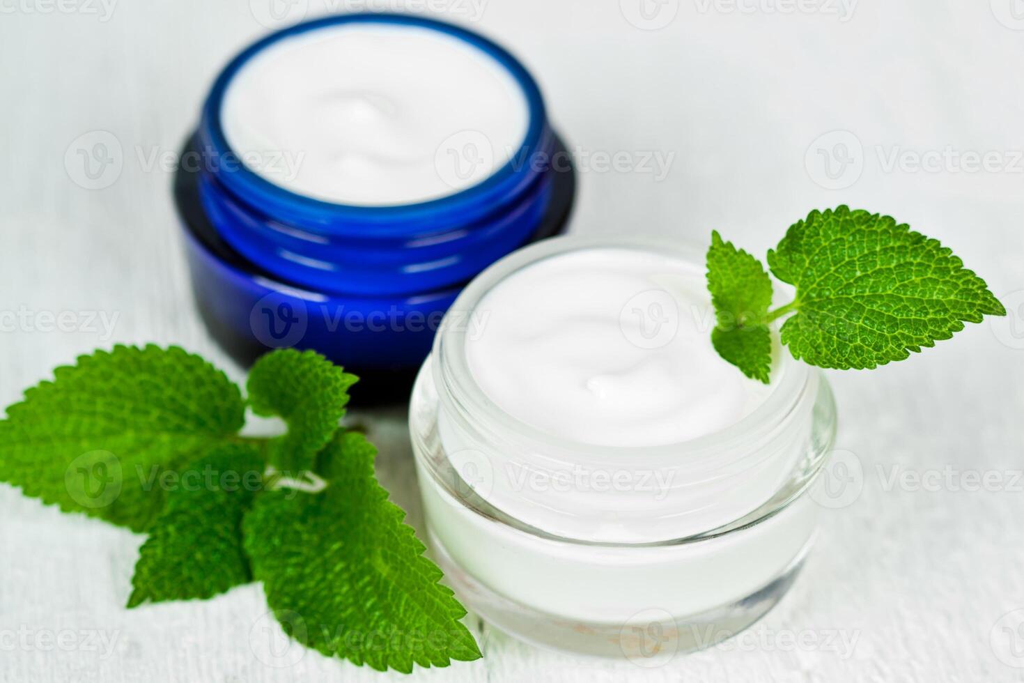 face cream in jars with urtica photo