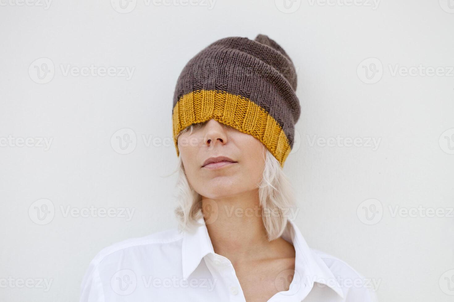 Beautiful woman in warm brown beanie hat. photo