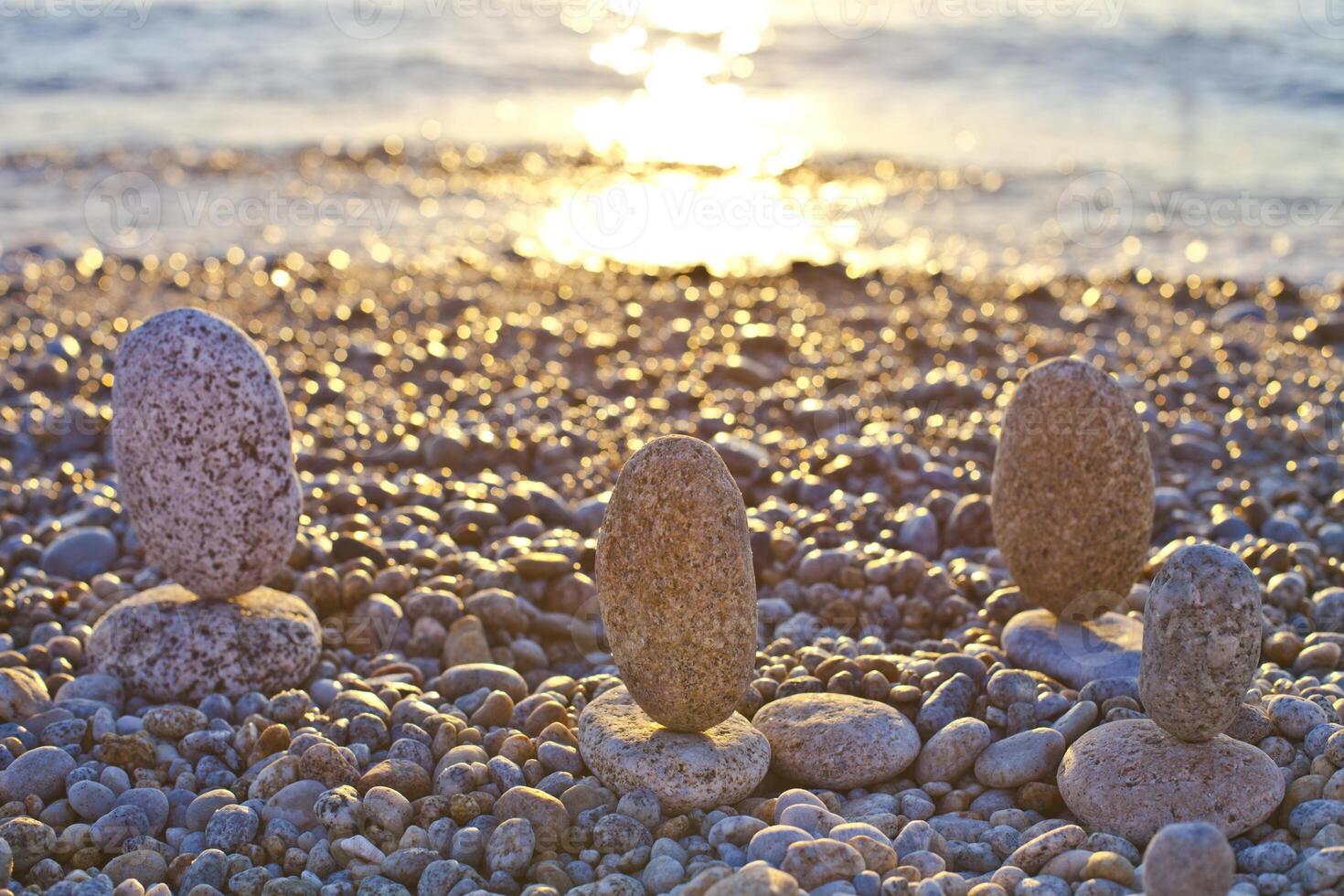 Beautiful seascape, amazing view of pebble coastline in mild sunset light. photo