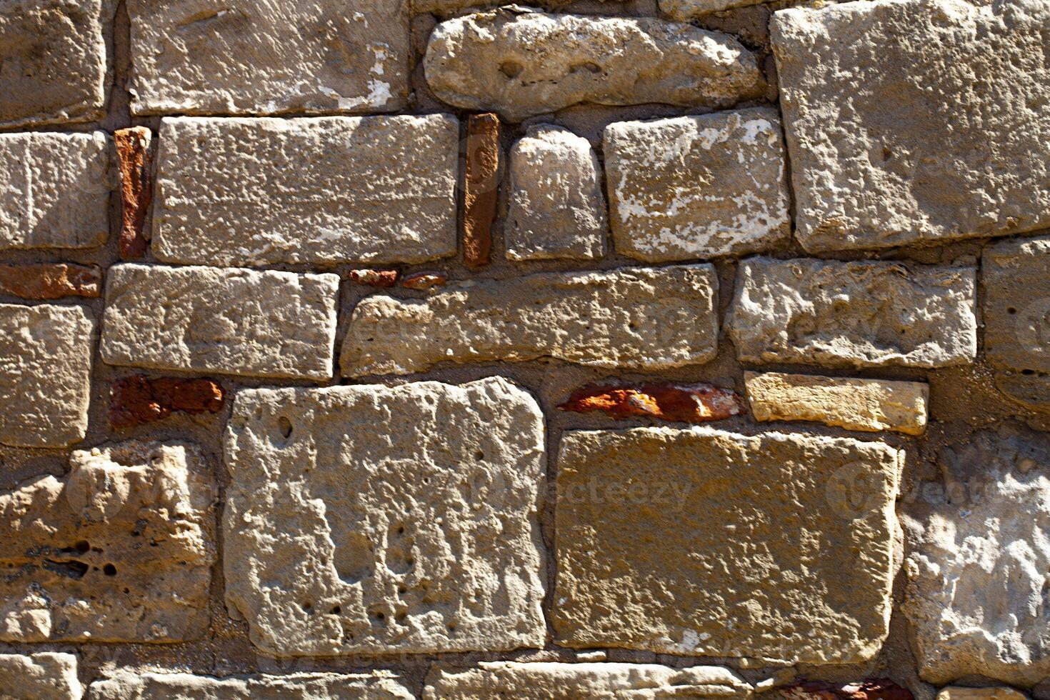 Antique brick wall texture close up. photo