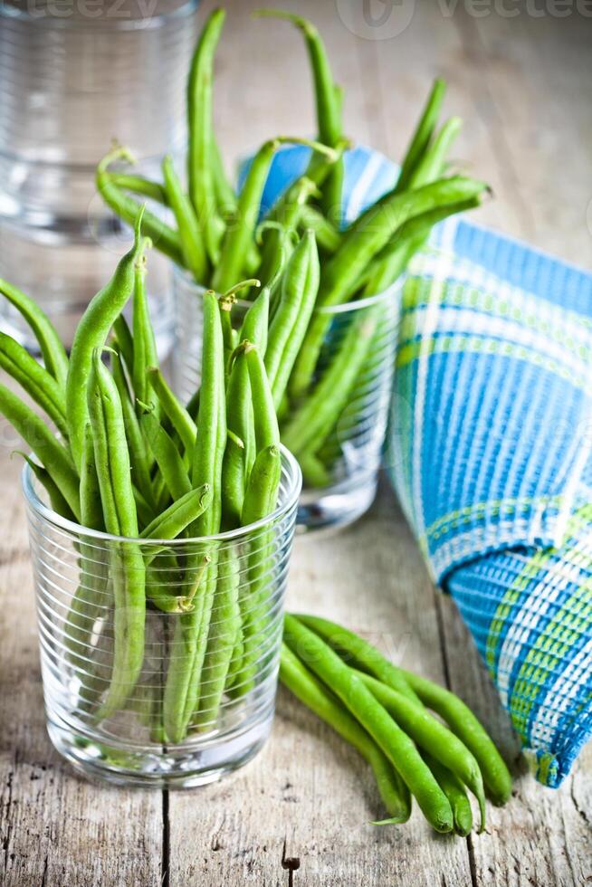 green string beans in glasses photo