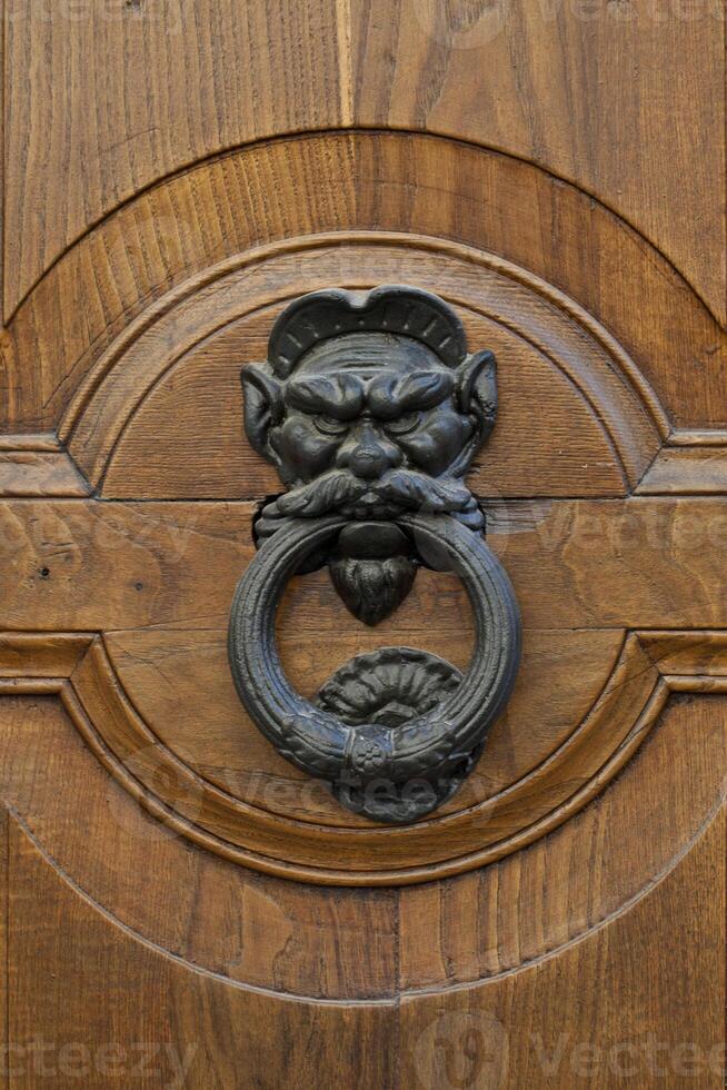 Ancient italian door knocker. photo