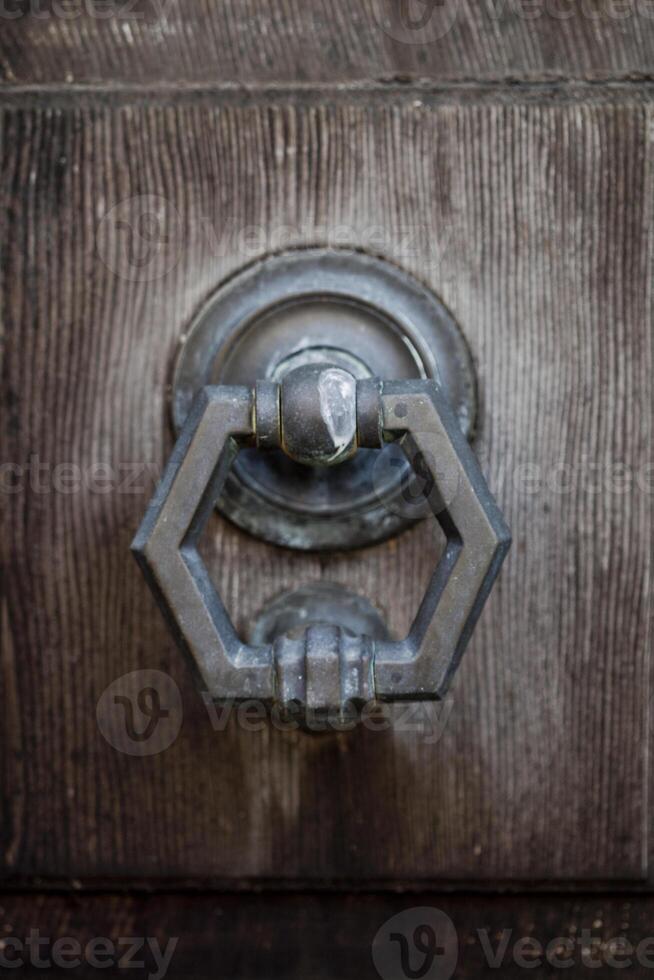 Ancient italian door knocker. photo