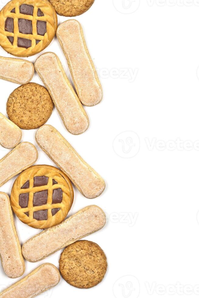 Savoiardi cookies, oat cookies and tarts with dark chocolate isolated on white background. photo