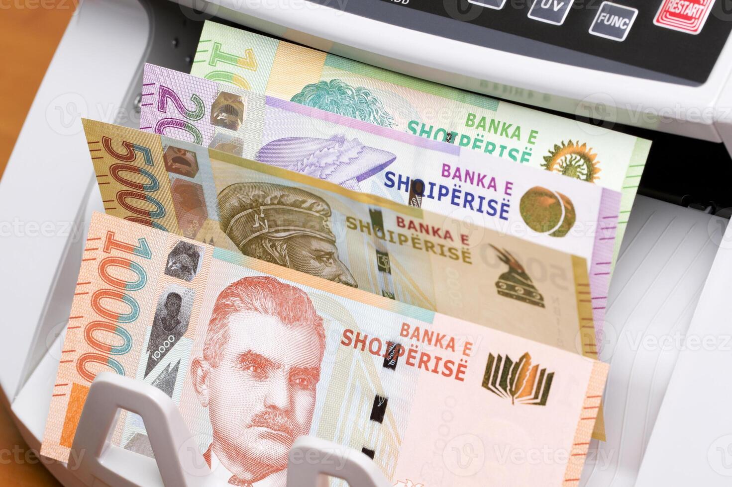 Albanian lek in the counting machine photo