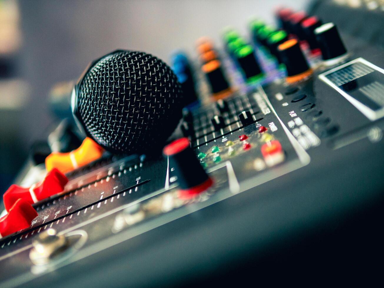 Close-up microphone on sound mixer in live broadcasting studio producer for sound record control system production and audio equipment and music instrument photo