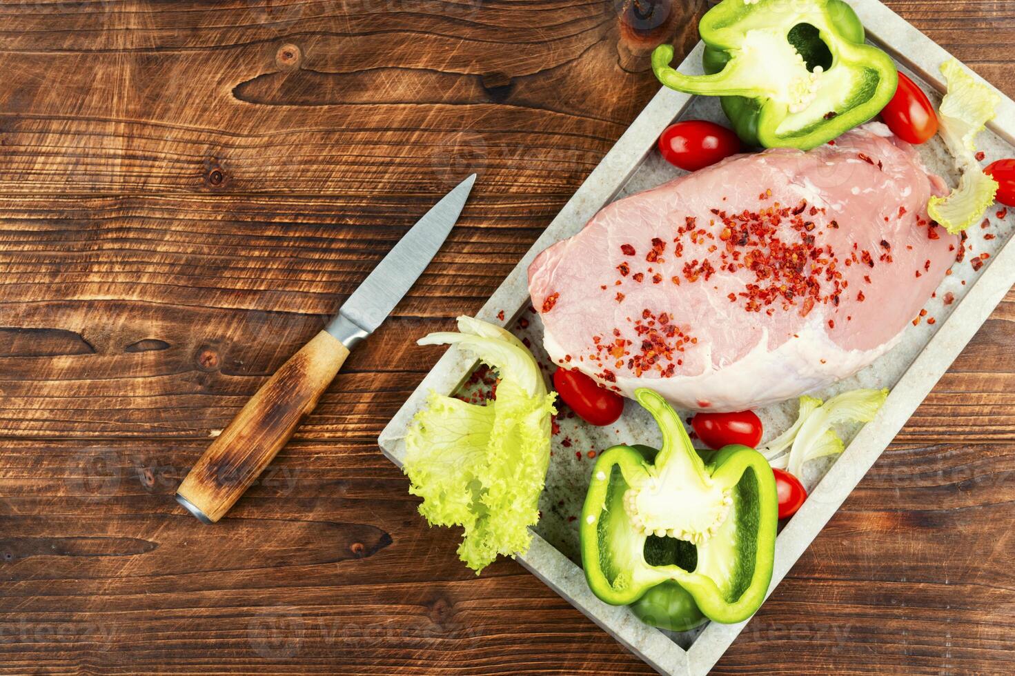 Raw cut of pork meat. photo