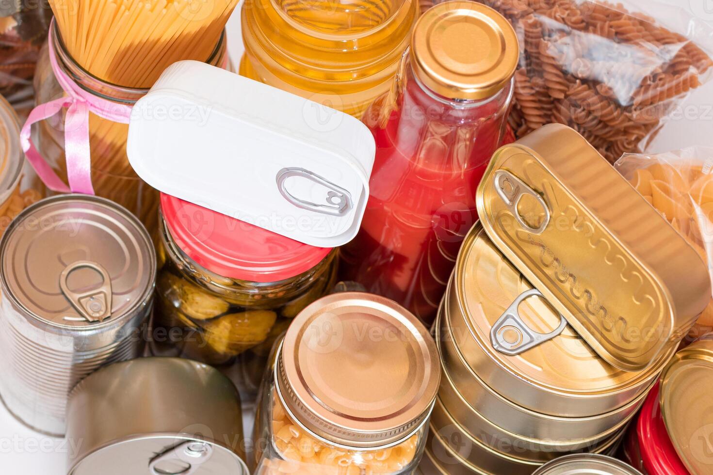 Food Reserves. Canned Food, Spaghetti, Pate, Tuna, Tomato Juice, Pasta, Fish and Grocery. Emergency Food Storage in Case of Crisis. Strategic Food Supplies photo