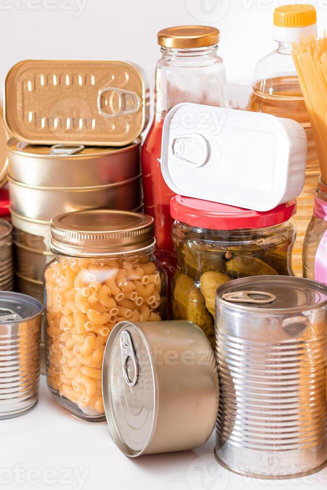 Food Reserves. Canned Food, Spaghetti, Pate, Tuna, Tomato Juice, Pasta, Fish and Grocery. Emergency Food Storage in Case of Crisis. Strategic Food Supplies photo