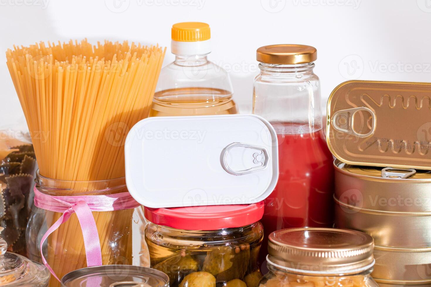 Food Reserves. Canned Food, Spaghetti, Pate, Tuna, Tomato Juice, Pasta, Fish and Grocery. Emergency Food Storage in Case of Crisis. Strategic Food Supplies photo