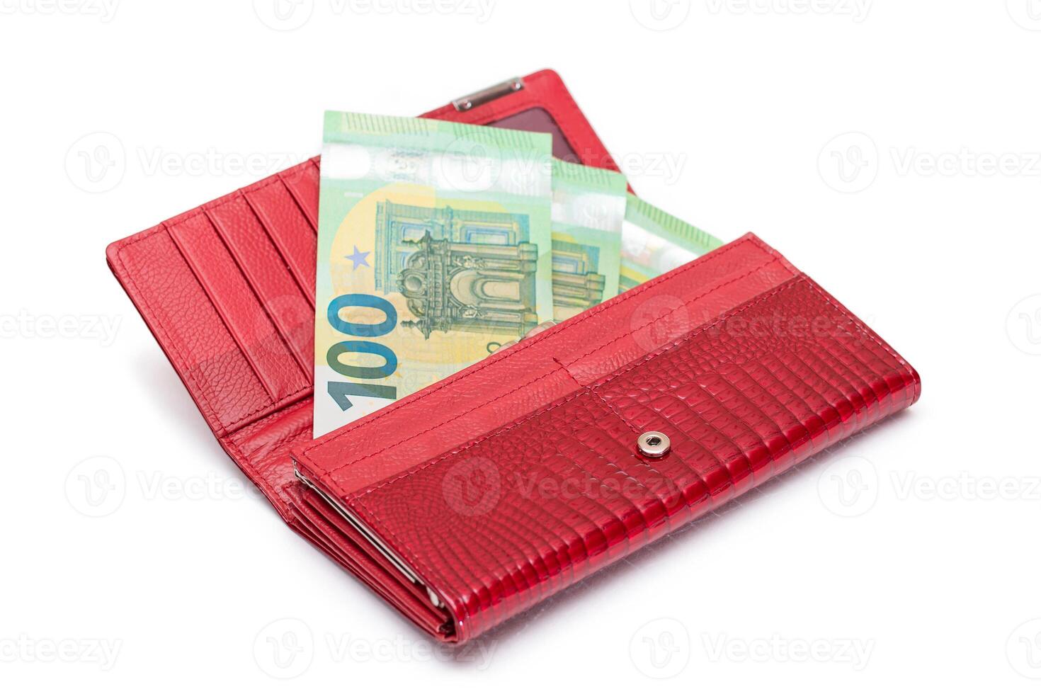 Opened Red Leather Women Purse with One Hundred Euro Banknotes Inside - Isolated on White Background. A Wallet Full of Money Symbolizing Wealth, Success, Shopping and Social Status - Isolation photo