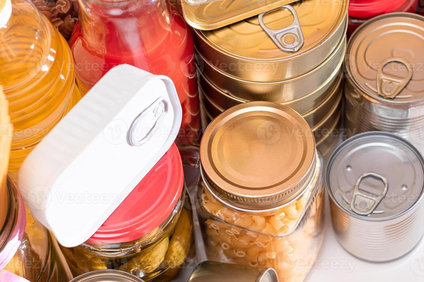 Food Reserves. Canned Food, Spaghetti, Pate, Tuna, Tomato Juice, Pasta, Fish and Grocery. Emergency Food Storage in Case of Crisis. Strategic Food Supplies photo