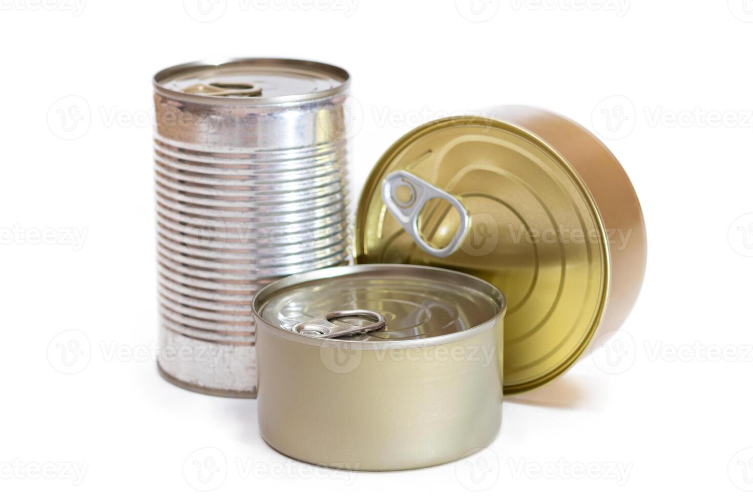 A Group of Stacked Tin Cans with Blank Edges Isolated on White Background. Canned Food. Different Aluminum Cans for Safe and Long Term Storage of Food. Steel Sealed Food Storage Containers - Isolation photo