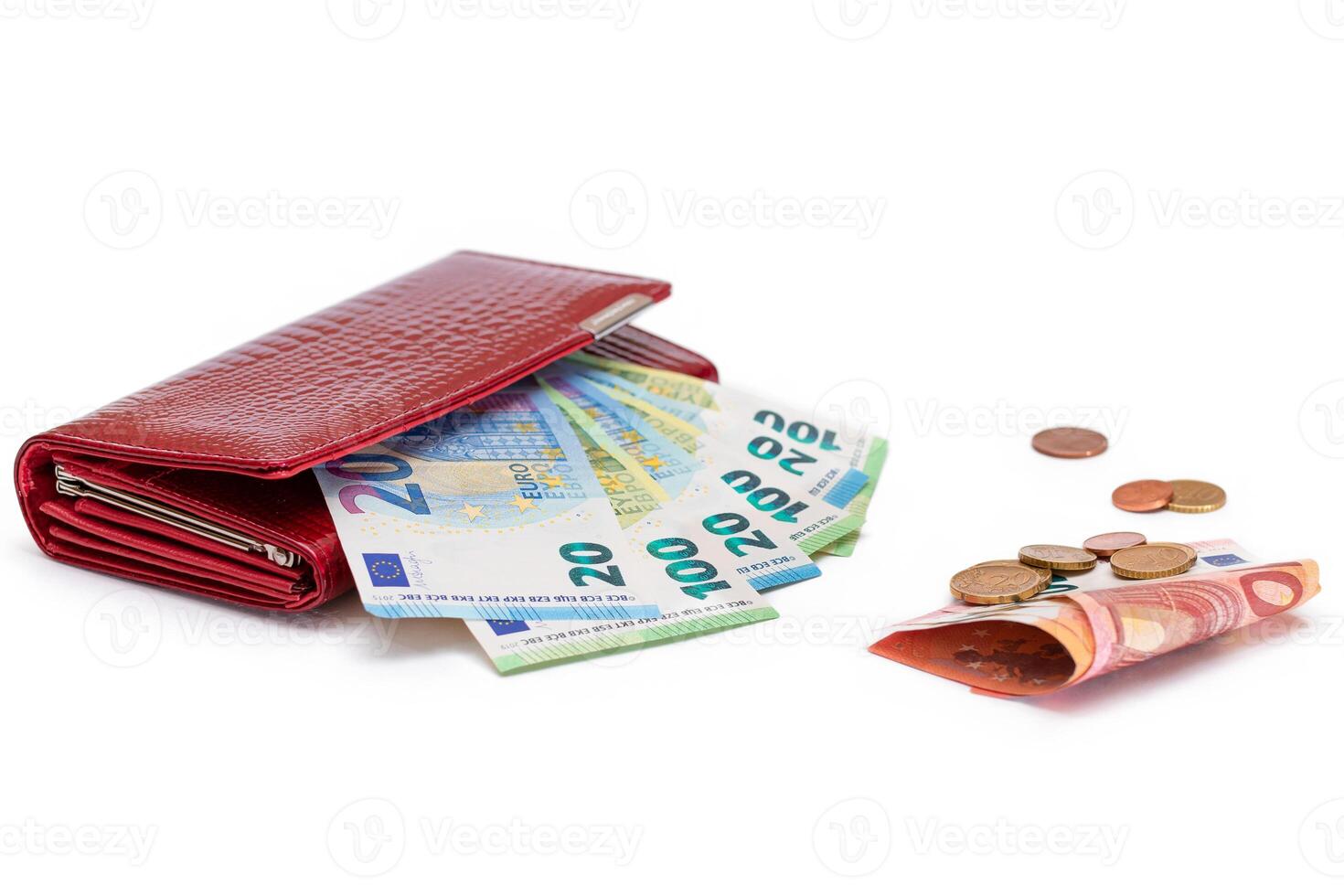 Red Leather Women Purse with Different Euro Banknotes and Euro Cent Coins - Isolated on White Background. A Wallet Full of European Union Paper Money Symbolizing Wealth and Success - Isolation photo