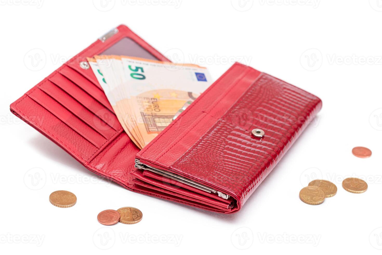 Opened Red Women Purse with 50 Euro Banknotes Inside and Scattered Euro Cent Coins - Isolated on White Background. A Wallet Full of Money Symbolizing Wealth, Success, Shopping and Social Status - Isolation photo