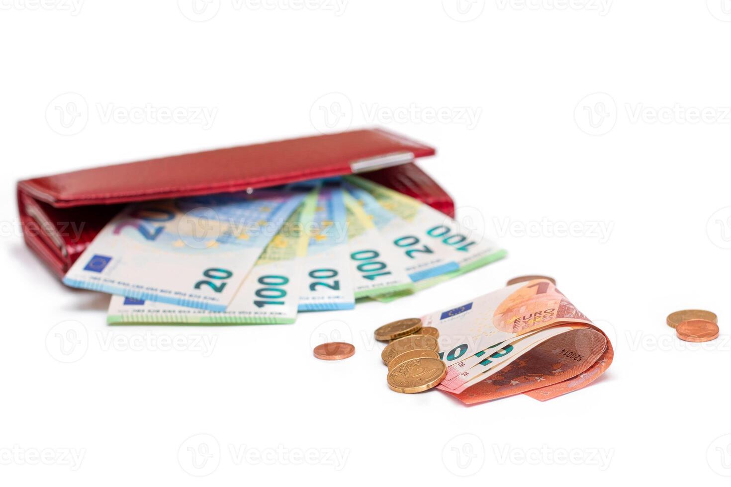 Red Leather Women Purse with Different Euro Banknotes and Euro Cent Coins - Isolated on White Background. A Wallet Full of European Union Paper Money Symbolizing Wealth and Success - Isolation photo