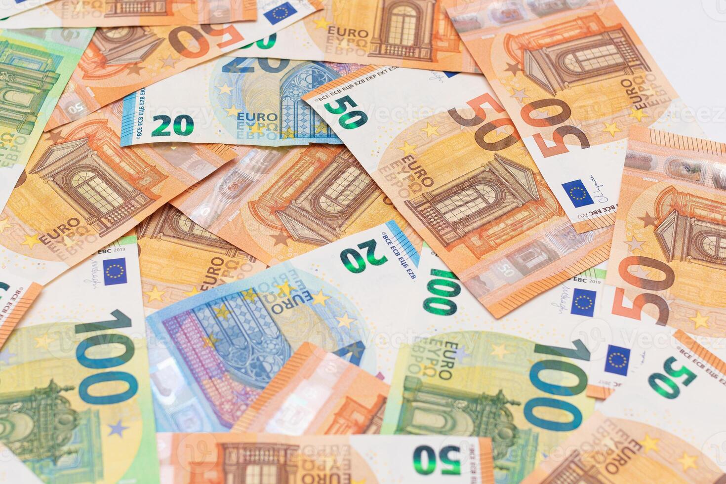 Different Euro Banknotes Money Background. Euro Money Currency. Colored Paper Money. A Lot of Fifty Euro Bills. Business, Finances, Cash and Money Saving Concept photo