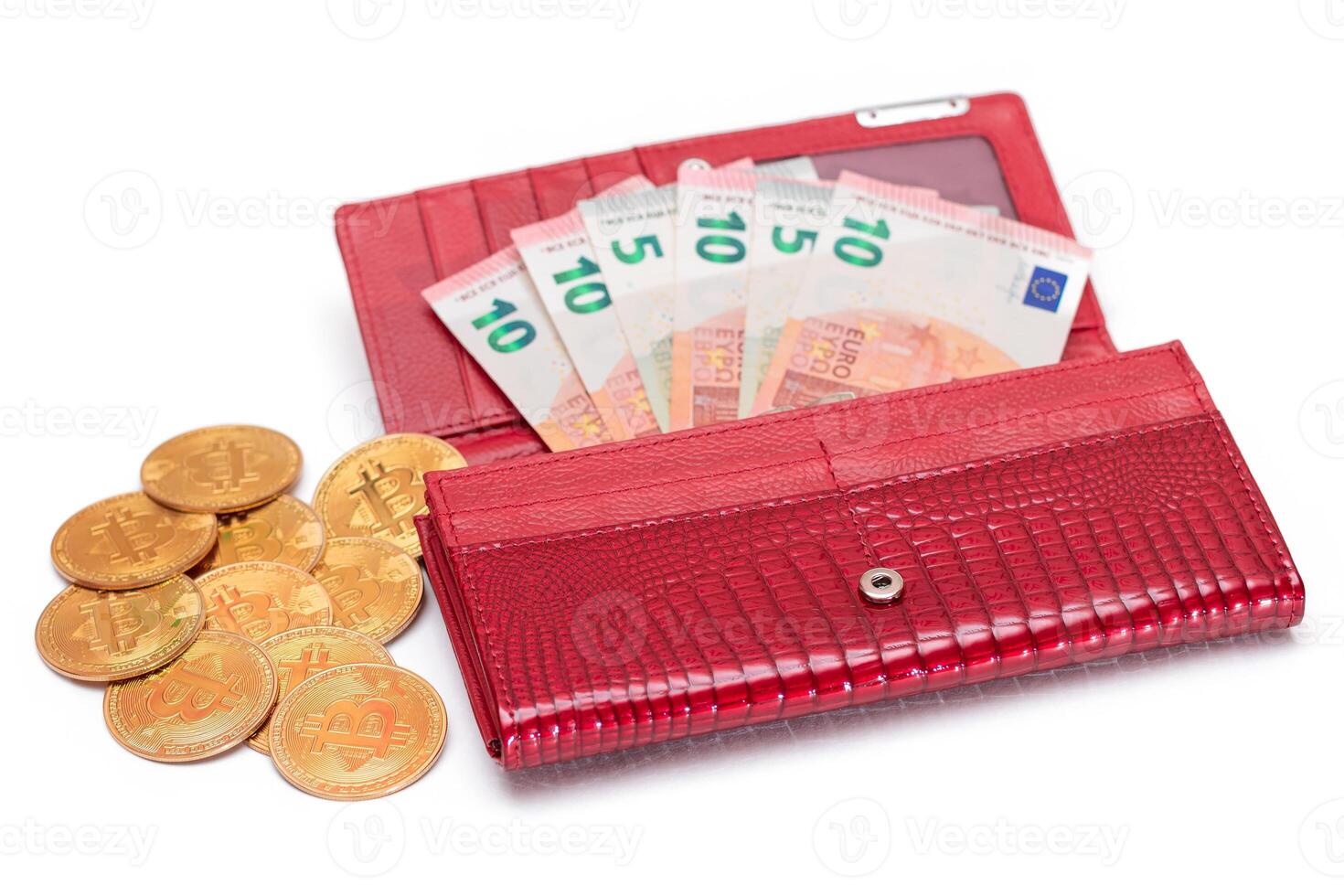 Opened Red Women Purse with 10 Euro Banknotes Inside and Bitcoin Coins - Isolated on White Background. A Wallet Full of Money Symbolizing Wealth, Success, Shopping and Social Status - Isolation photo