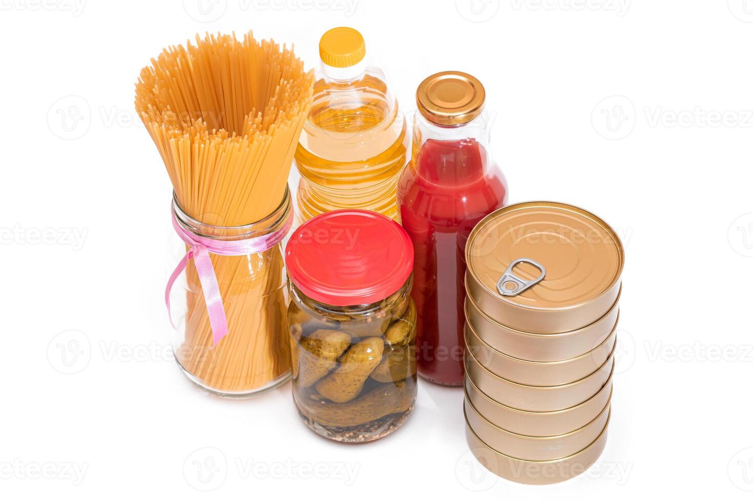 Food Reserves. Canned Food, Spaghetti, Pate, Tuna, Tomato Juice, Pasta, Fish and Grocery - Isolated on White Background. Emergency Food Storage in Case of Crisis. Strategic Food Supplies - Isolation photo