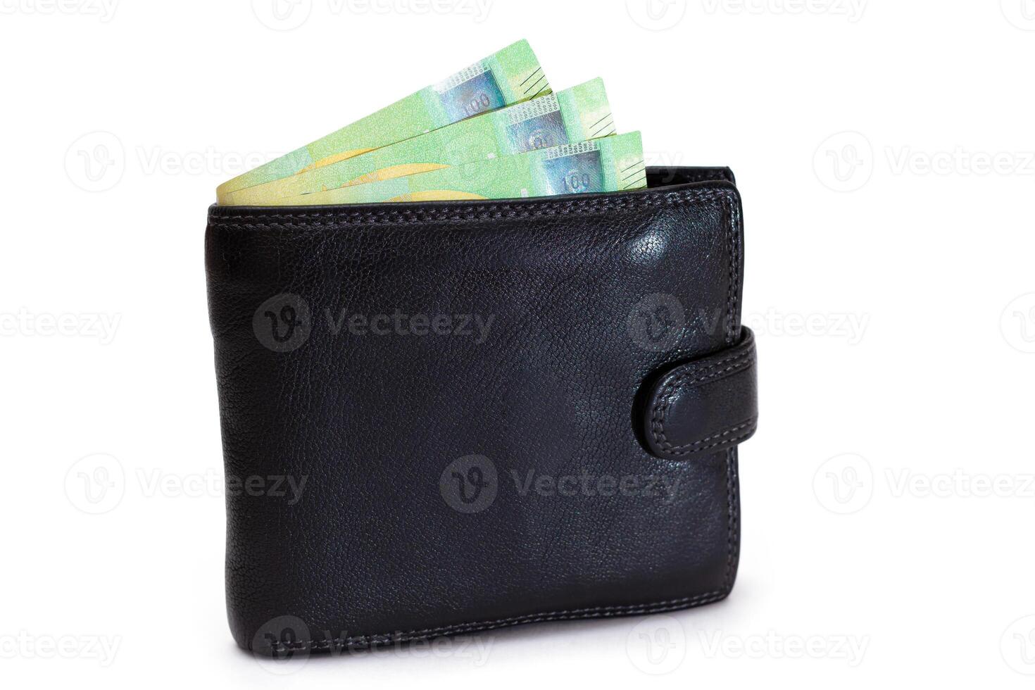 Black Leather Men Wallet with Euro Banknotes Inside - Isolated on White Background. A Purse Full of Money Symbolizing Wealth, Success and Social Status - Isolation photo