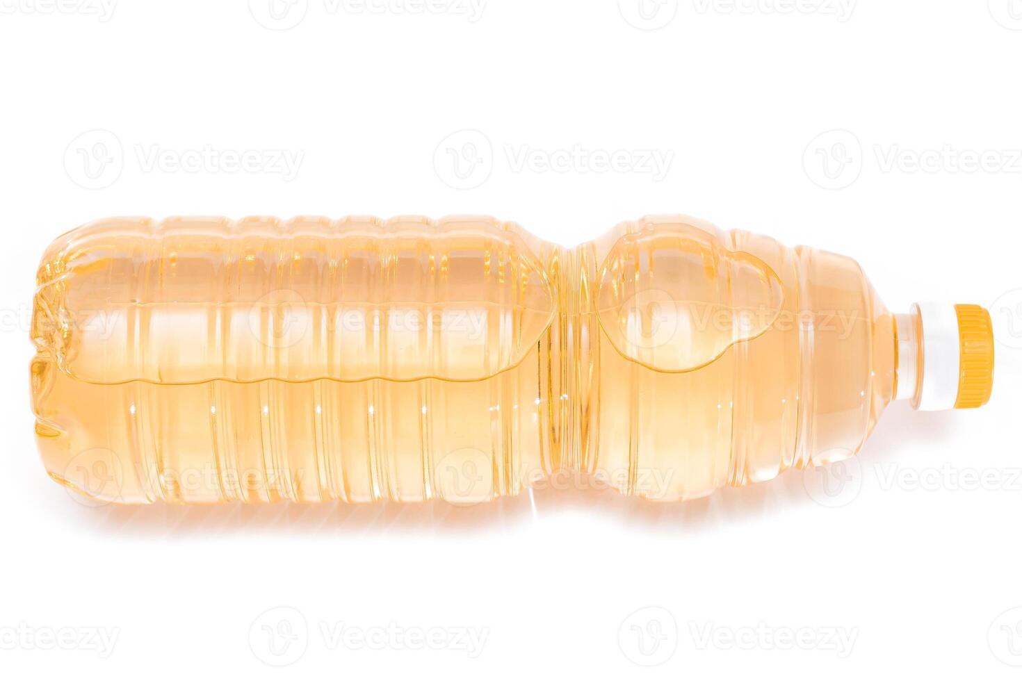 A Plastic Bottle of Sunflower Oil Isolated on White Background photo