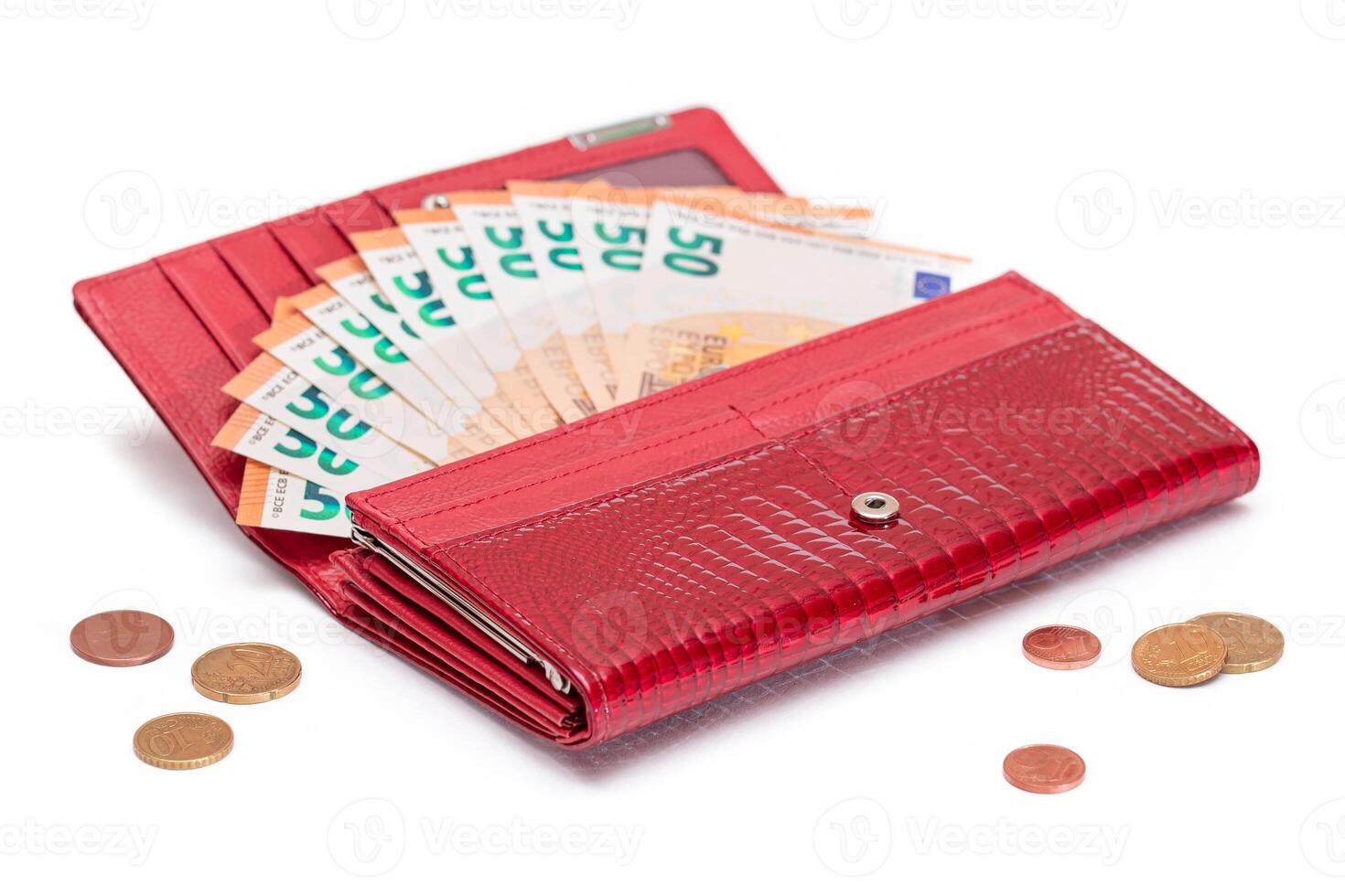 Opened Red Women Purse with 50 Euro Banknotes Inside and Scattered Euro Cent Coins - Isolated on White Background. A Wallet Full of Money Symbolizing Wealth, Success, Shopping and Social Status - Isolation photo