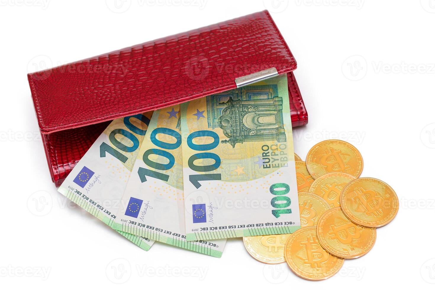 Opened Red Leather Women Purse with Bitcoin Coins and One Hundred Euro Banknotes Inside - Isolated on White Background. A Wallet Full of Money Symbolizing Wealth, Success and Social Status - Isolation photo