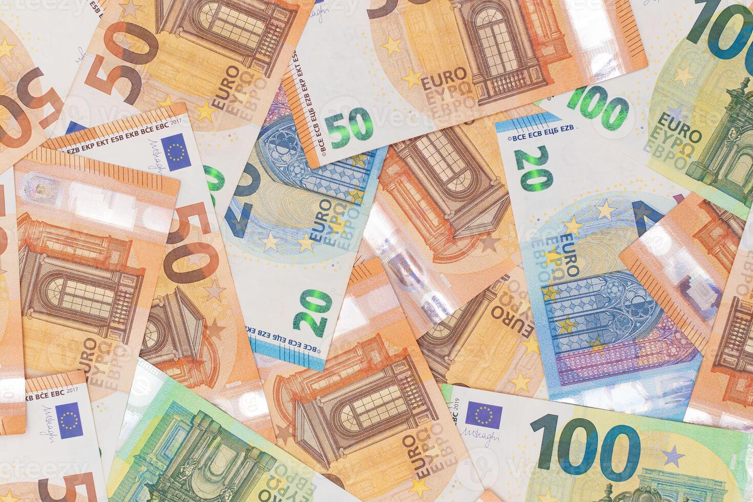 Different Euro Banknotes Money Background. Euro Money Currency. Colored Paper Money. A Lot of Fifty Euro Bills. Business, Finances, Cash and Money Saving Concept photo