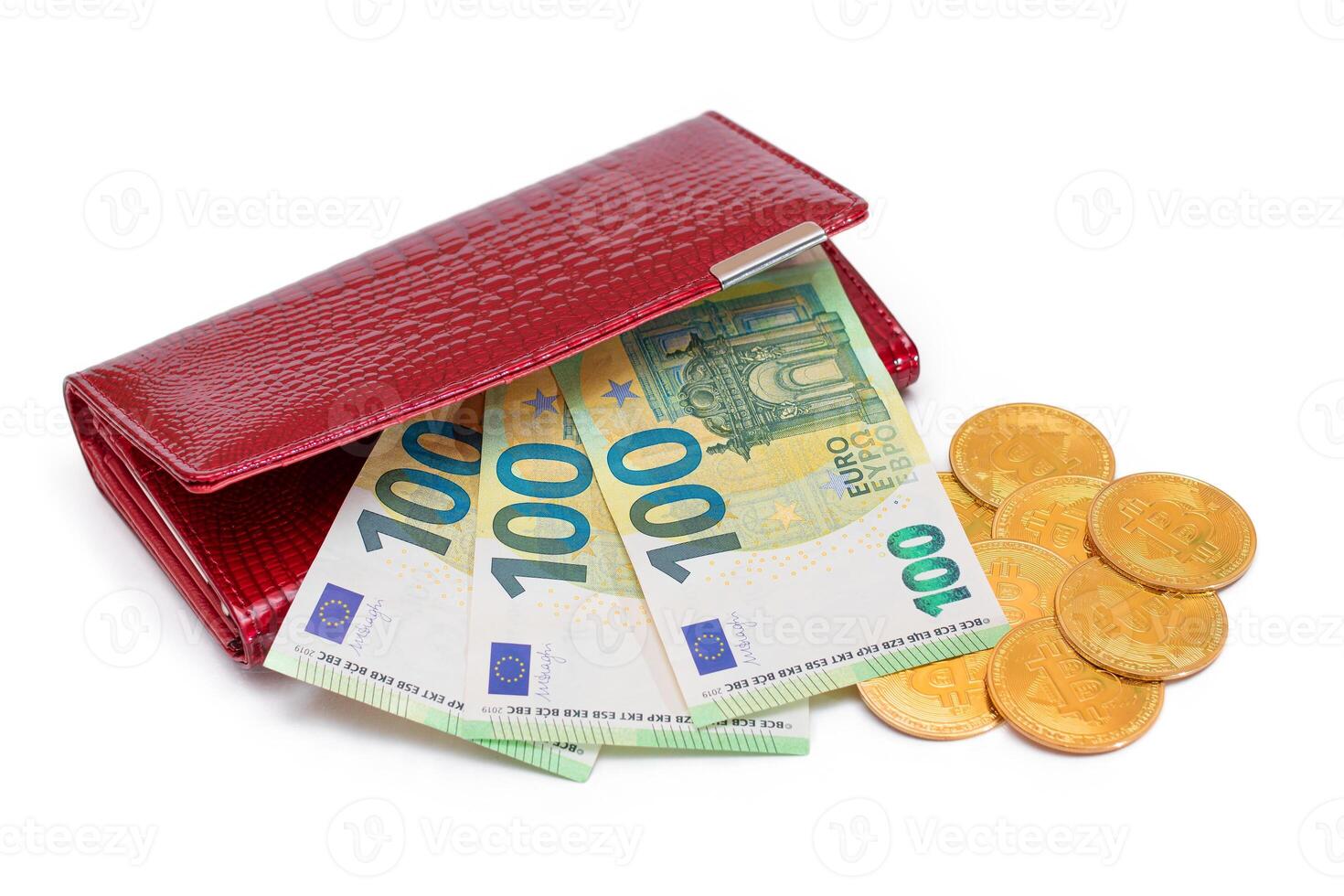 Opened Red Leather Women Purse with Bitcoin Coins and One Hundred Euro Banknotes Inside - Isolated on White Background. A Wallet Full of Money Symbolizing Wealth, Success and Social Status - Isolation photo