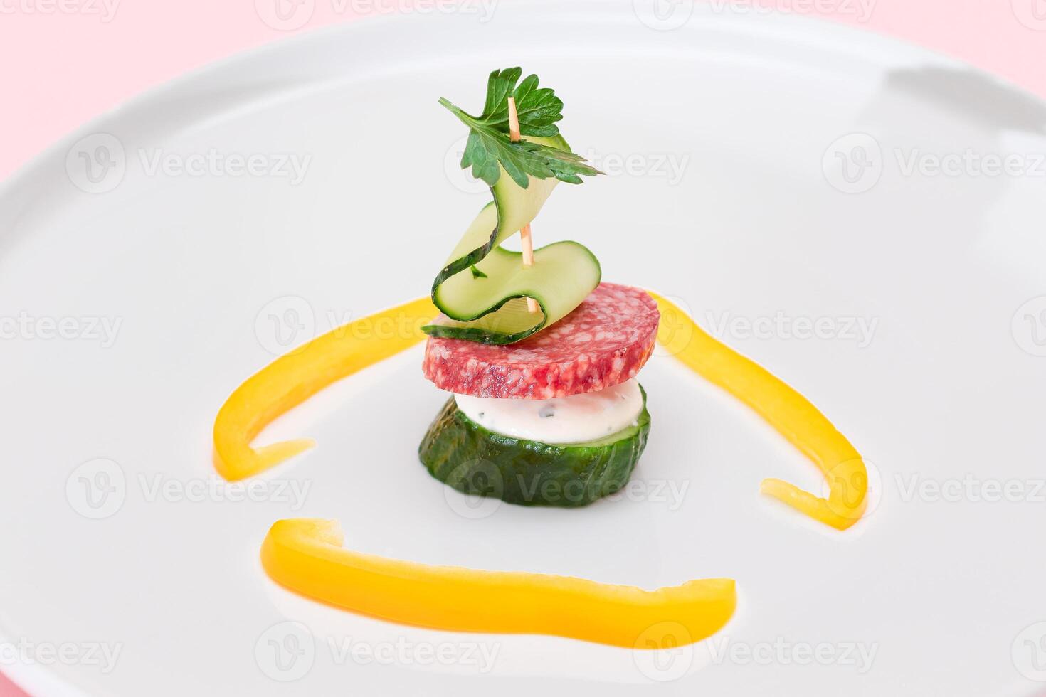 Canapes without Bread with Salami, Cucumber, Greens and Cream Cheese on White Plate. Easy Breakfast. Diet Food. Quick and Healthy Sandwiches. Healthy Snacks with Tasty Fillings photo
