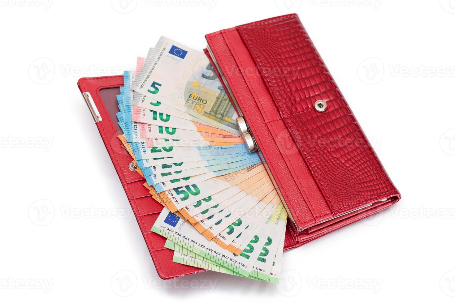 Red Leather Women Purse with Different Euro Banknotes - Isolated on White Background. A Wallet Full of European Union Paper Money Symbolizing Wealth, Success and Social Status - Isolation photo