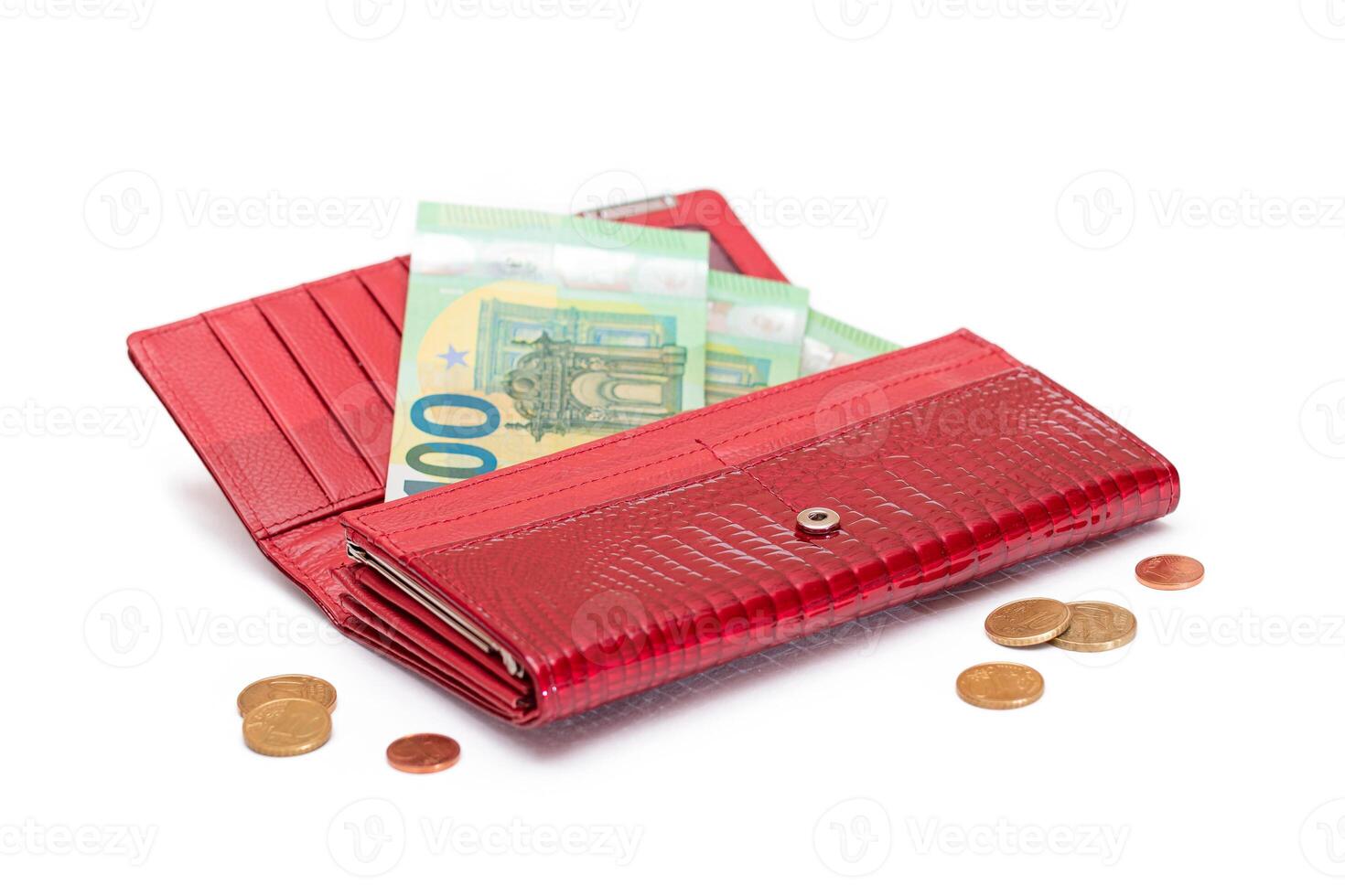 Opened Red Leather Women Purse with One Hundred Euro Banknotes Inside and Euro Cent Coins - Isolated on White Background. A Wallet Full of Money Symbolizing Wealth and Success - Isolation photo